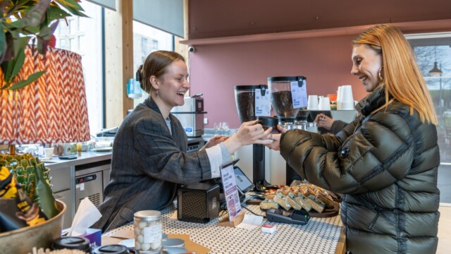 Photo of a barista serving coffee to a customer in Arthur's Coffee House, Brent Cross Town. (Brent Cross Town)