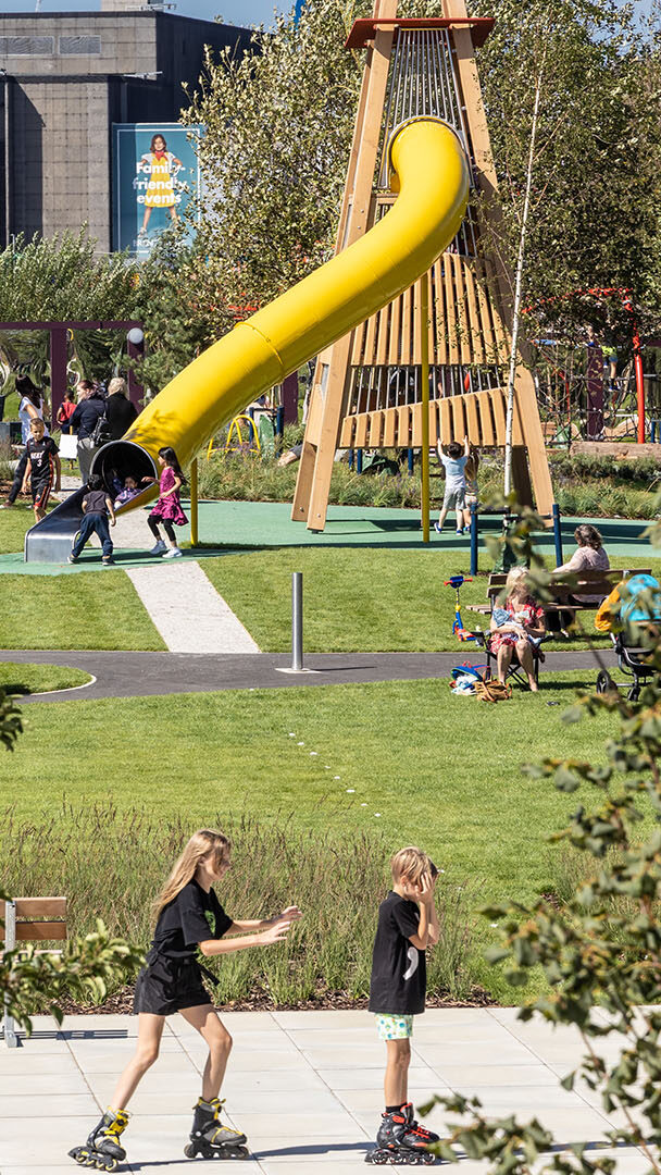 Photo of families enjoying the sun in Exploratory Park, Brent Cross Town. (Brent Cross Town)