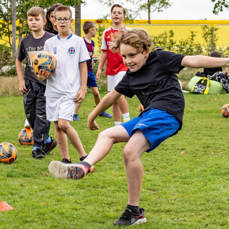 Kids playing football in Claremont Park, Brent Cross Town (Brent Cross Town)