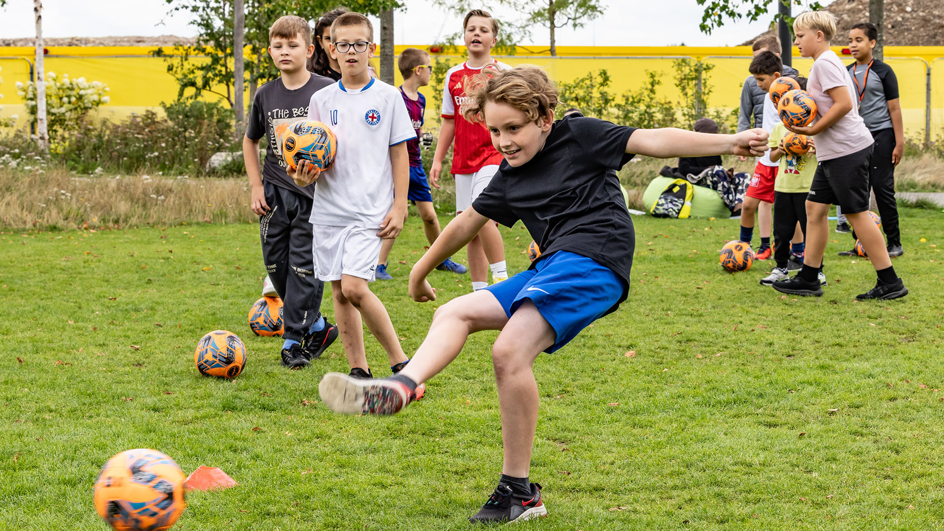 Kids playing football in Claremont Park, Brent Cross Town (Brent Cross Town)