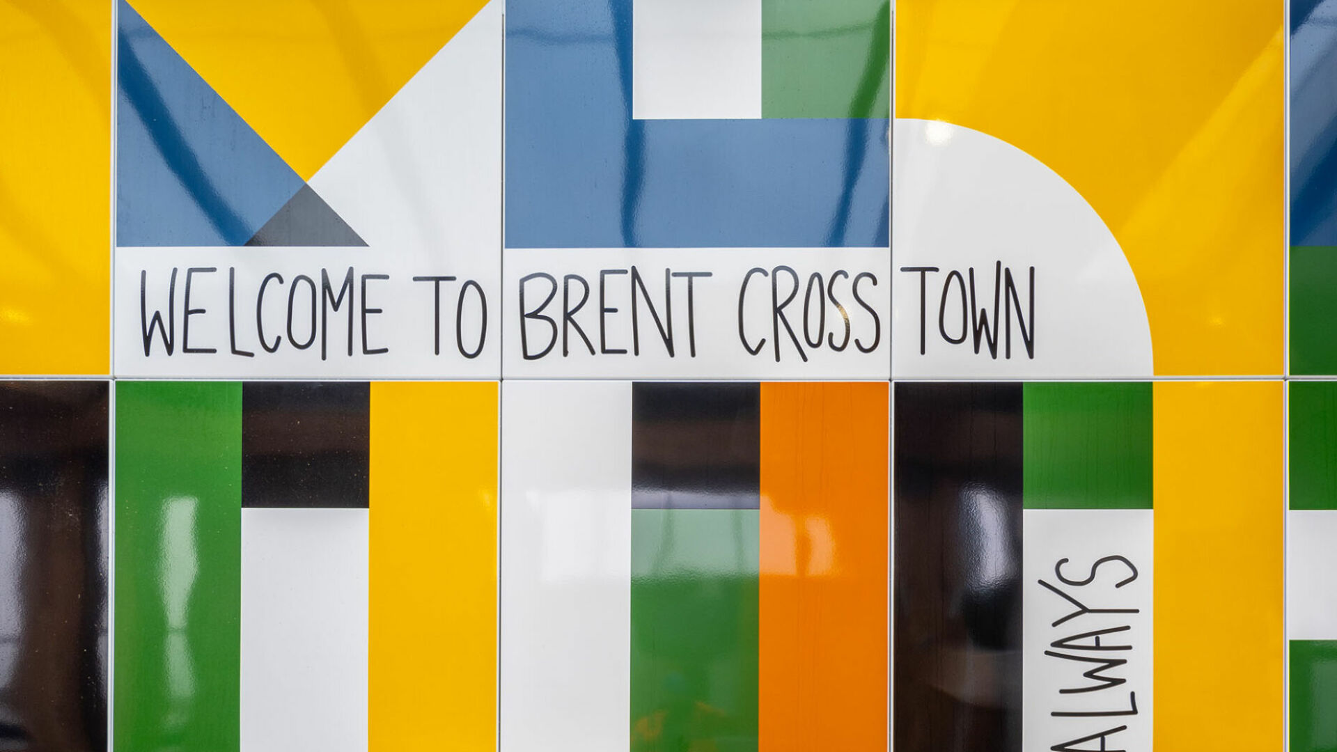 Giles Round's artwork 'Time Passes & Still I Think of You' at Brent Cross West station (Brent Cross Town)