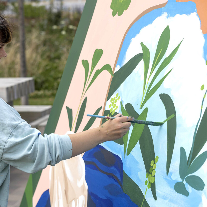 Artist Jo Hicks painting a panel for the Maze in Claremont Park, Brent Cross Town (Brent Cross Town)