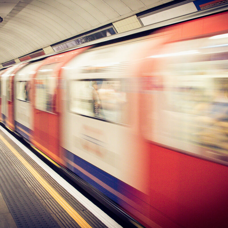 A tube train speeding through the London Underground (Brent Cross Town)