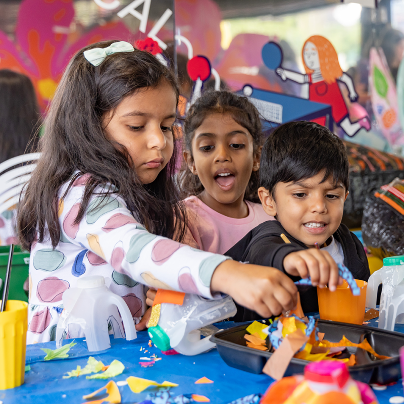 Children at an arts & crafts session in Claremont park, Brent Cross Town
