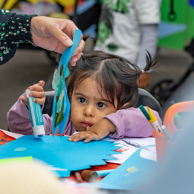 Young people enjoying a mask making workshop, part of the Summer Program at Brent Cross Town