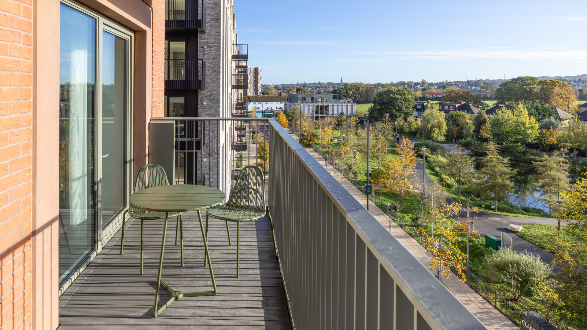 Photo of a balcony - and the view of the park beyond - from The Maple in Brent Cross Town. (Brent Cross Town)