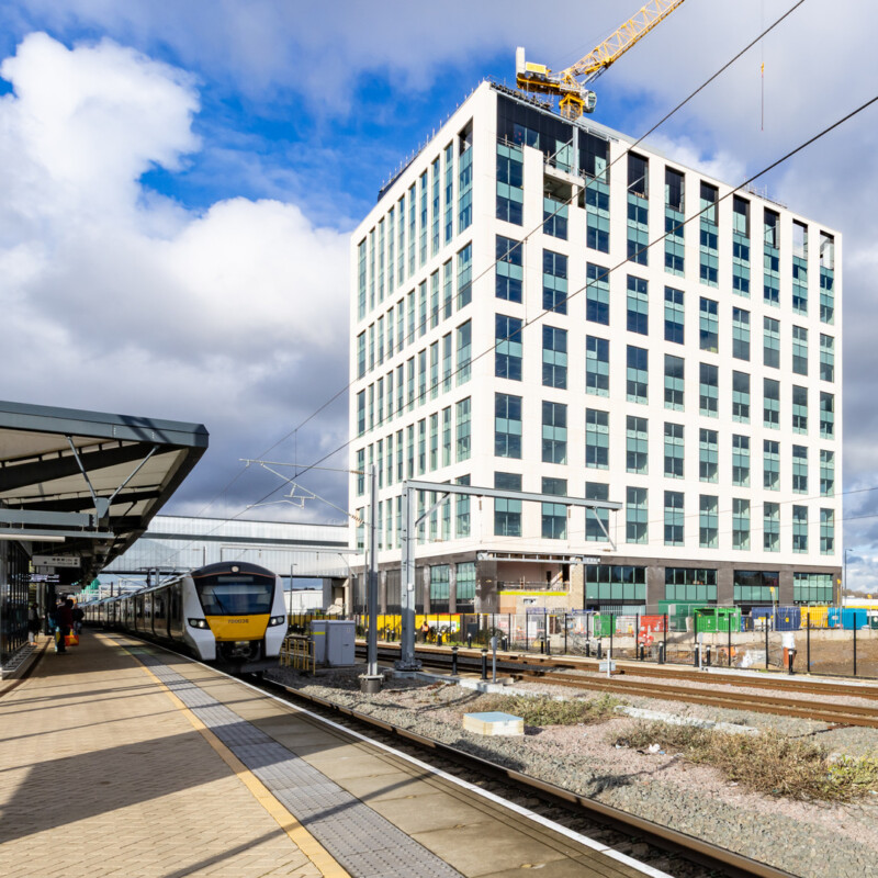 Photo of 3 Copper Square, an office block in Brent Cross Town, viewed from a railway platform. (Brent Cross Town)