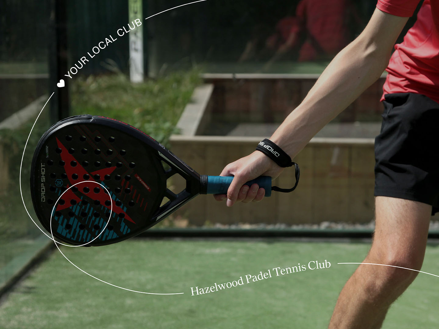 Hand swinging a tennis padel (Brent Cross Town)