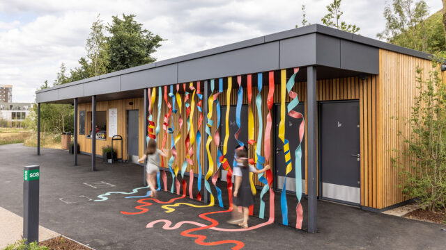 Photo of the colourful Rainbow of Ribbons installation by Hanna Benihoud at Claremont Park, Brent Cross Town. (Brent Cross Town)