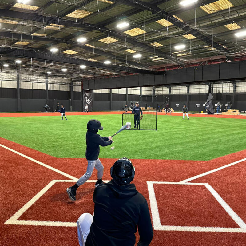 Boy batting at the 108 indoor baseball facility in Brent Cross Town (Brent Cross Town)