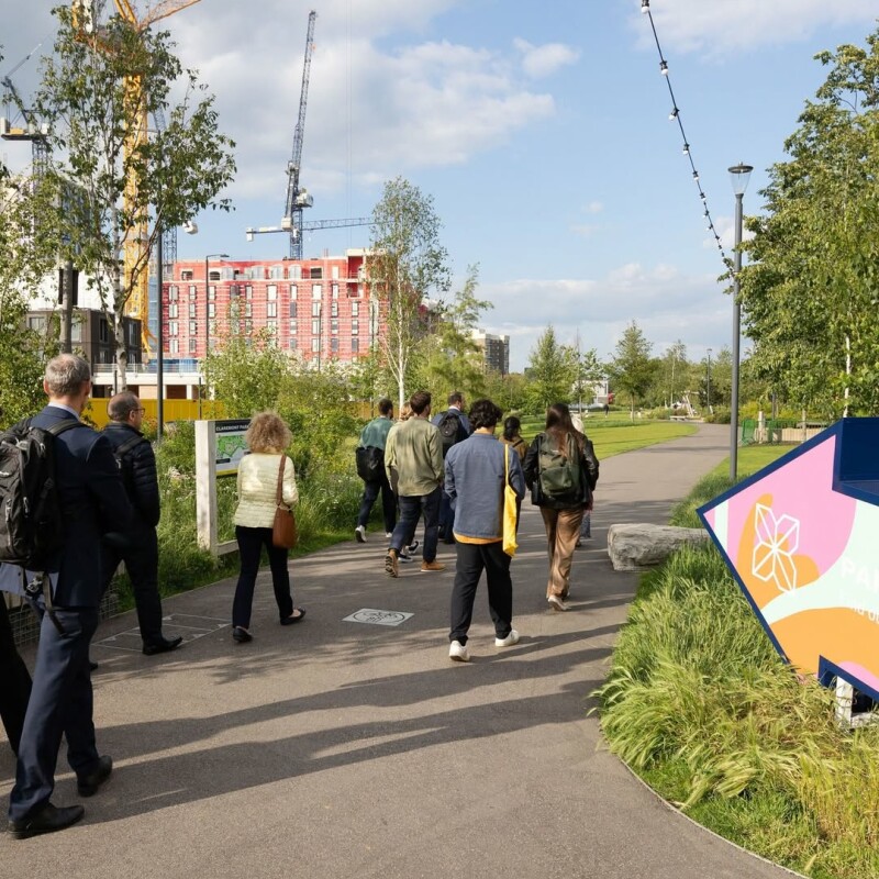 Photo of people on a walking tour of brent Cross Town, exploring the park. (Brent Cross Town)